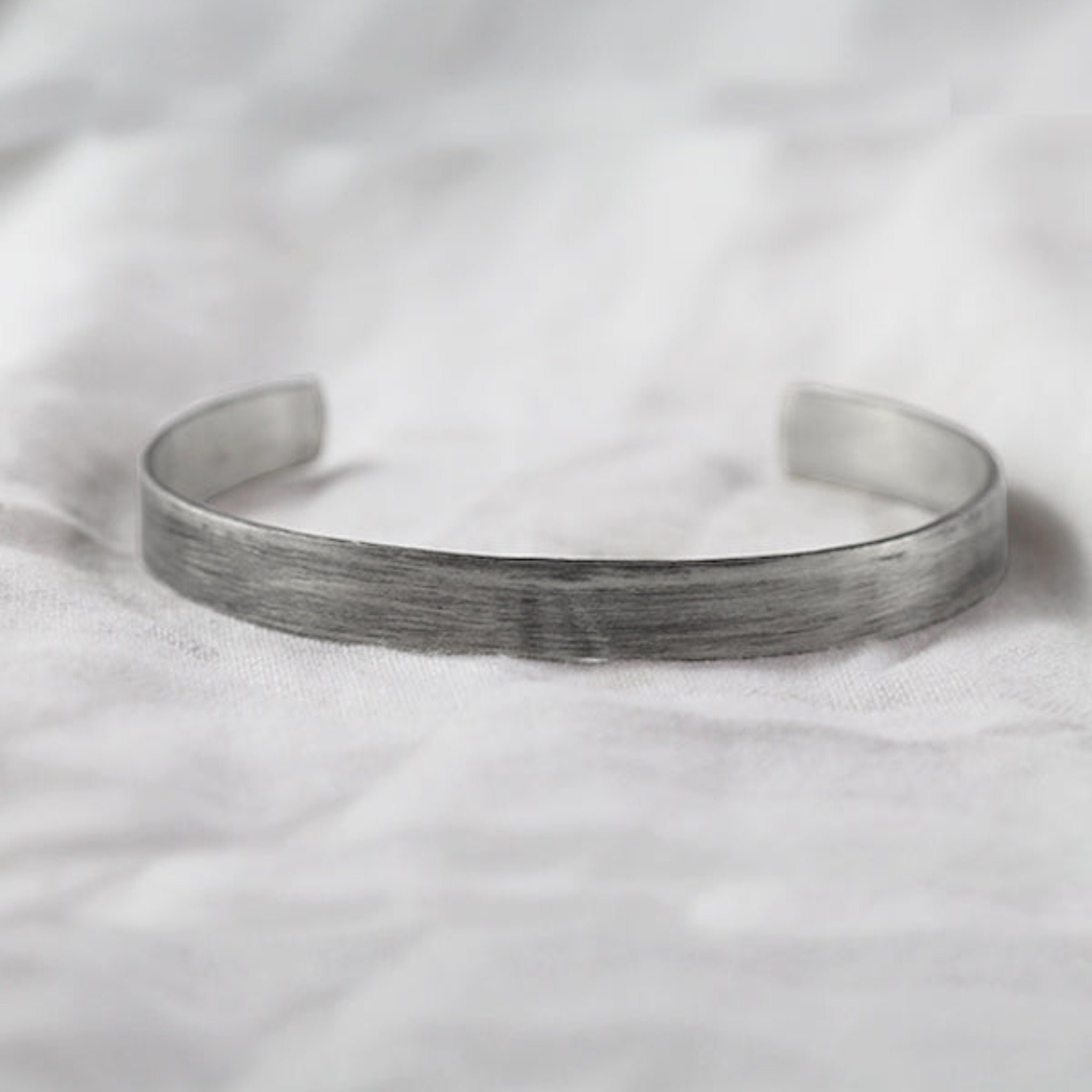 rugged personalized silver cuff